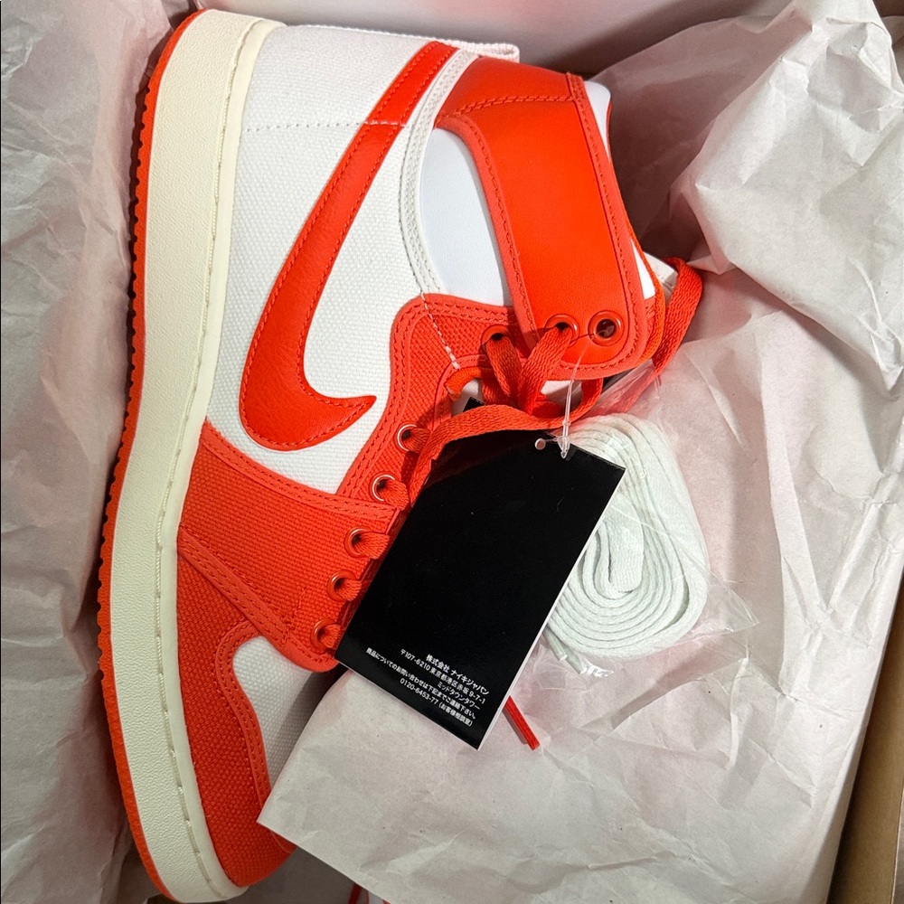 Nike Jordan Retro 1 White and Orange High Top Sneakers